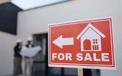 A for-sale sign outside a home